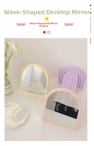 Irregular wavy desk mirror detail showing cream yellow, lavender and pink frames