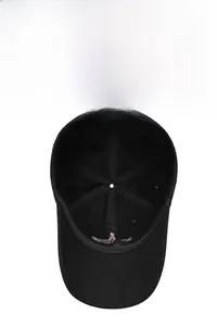 Detail view of the black baseball cap showing reinforced inner seams and breathable eyelets