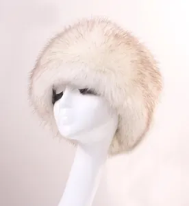 Detailed close-up of fluffy faux fur texture in white with brown tips on a winter hat