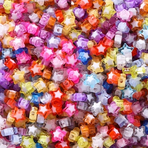 Macro shot of colorful translucent acrylic star beads for DIY jewelry and phone charms