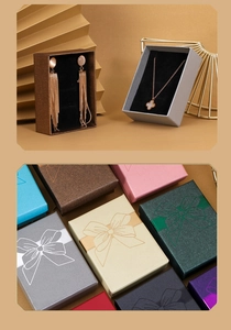 Various colored jewelry gift boxes with ribbon patterns for necklaces and earrings