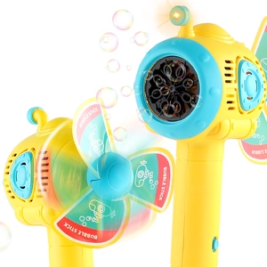 Submarine-shaped electric bubble gun in yellow with rotating fan and colorful bubbles