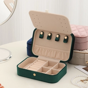 Multilayer velvet jewelry box featuring necklace hooks and rings storage in emerald green