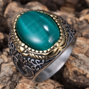 Vintage men's stainless steel ring with green cat eye stone and flame engravings