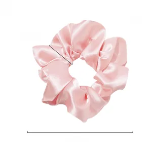 Pink silk satin scrunchie detail showing 4.7 inch diameter size and 2 inch width