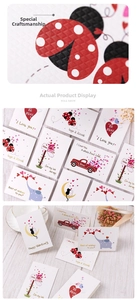 Detail showing embossed textures and cute animal motifs on Valentine's greeting cards