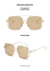 Detail of square oversized brown sunglasses with semi-transparent frame and metal hinges
