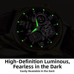 Macro view of luminous hands and indices on a black mechanical watch face with sub-dials