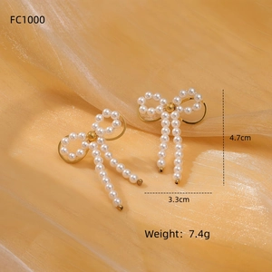 Elegant gold bow pearl tassel earrings for women with dimensions 4.7cm x 3.3cm