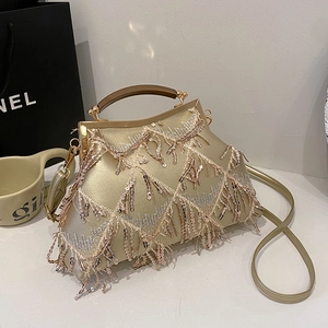 Champagne sequin evening bag with tassel fringe and vintage wooden top handle