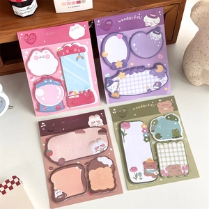 Close-up of cute cartoon shaped sticky notes in pastel colors for journaling