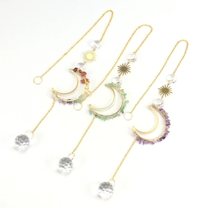 Three-piece suncatcher set with gold moon sun pendants, colorful crystals, and glass balls