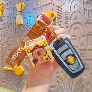 Mini Capybara cube keychain with brown strap and cartoon animal pattern designs