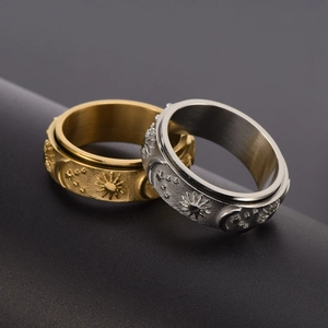 Anillos giratorios de acero inoxidable con motivos de sol luna y estrellas en oro y plata