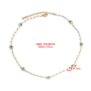 Detail of evil eye necklace with white pearls and gold chain measuring 365mm plus 50mm