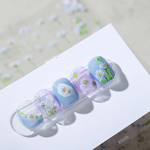 Daisy floral nail stickers in light blue and lavender purple with glossy finish