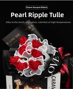 Detail of white wave mesh flower wrap with pearl edges and LOVE YOU decorative text