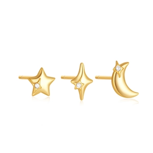 Detailed view of gold star and moon stud earring set with sparkling white zircon stones
