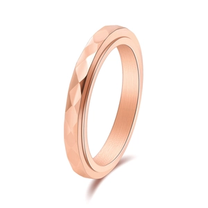 Minimalist diamond-cut rose gold stainless steel ring with geometric faceted texture
