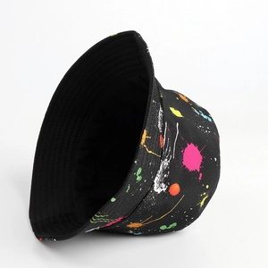 Detail of black reversible bucket hat with colorful tiger paint splatter graffiti print