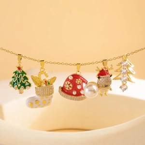 Festive gold titanium steel necklace with Christmas tree, deer, and stocking charms