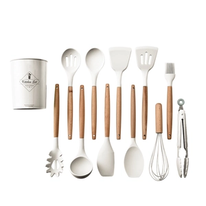 12-piece ivory silicone cooking utensil set with natural wooden handles and storage bucket