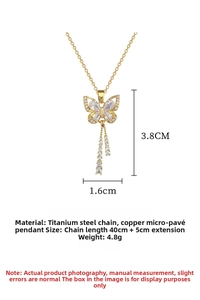 Detail of butterfly pendant necklace with white zircons and titanium steel chain