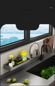 Detail view of gun grey kitchen organizer set showing sponge holder and lid rack