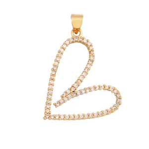 Detail of gold heart pendant with micro-pave zircons and precise size measurements