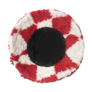 Macro shot of the plush red and white checkerboard pattern on the winter bucket hat