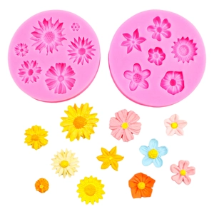 Pink silicone flower mold set for fondant and chocolate featuring daisy and rose patterns