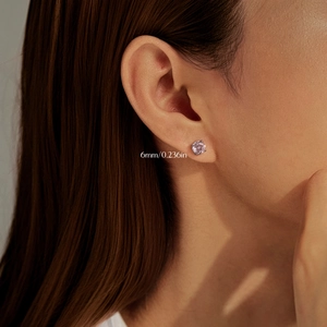 S925 sterling silver stud earrings with 6mm pink rose cut cubic zirconia on ear