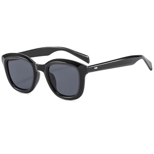 Classic retro round-frame sunglasses in glossy black with dark grey lenses and metal accents