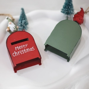 Vintage Christmas mailbox ornaments in red and green with miniature trees and Santa