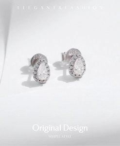 Macro shot of S925 sterling silver stamp on pear-shaped teardrop moissanite stud earrings