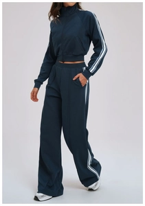 Detail of color-block windproof jacket with high collar zipper and triple side stripes