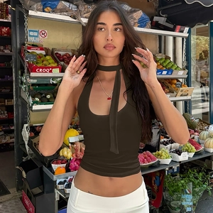 Detail of slim fit dark brown halter crop top with matching choker neck tie strap
