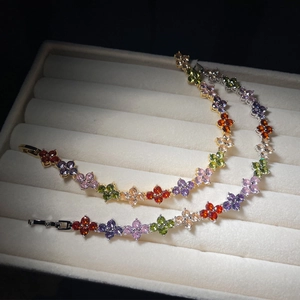 Luxury four leaf clover bracelets in gold and silver with colorful zircon crystals