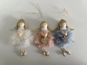 Detailed view of plush angel ornaments with glitter wings and hand-painted wood heads