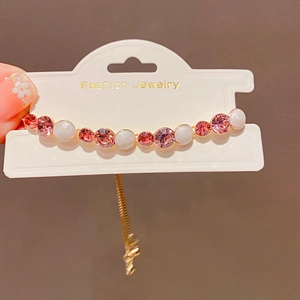 French palace style beaded bracelet with pink crystals and pearls on fashion jewelry card