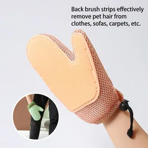 Orange pet grooming glove for hair removal and cleaning on clothes or sofa