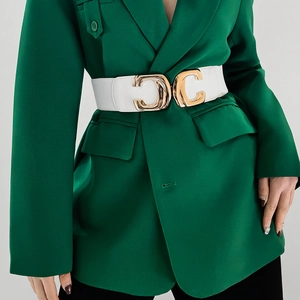 Detail of white elastic wide belt with golden C-shaped metal buckle on green blazer