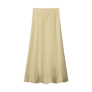 Detailed view of champagne gold satin midi skirt with elegant glossy drape and texture