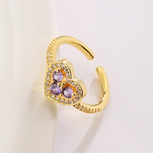 Elegant gold heart open ring with purple zircons and pave set sparkling crystals