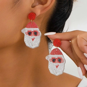 Handcrafted Santa Claus bead-woven earrings with red and white acrylic festive design