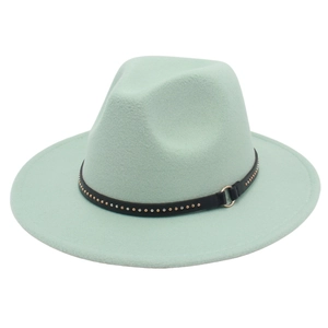 Detail of mint green fedora showing black leather belt with rivets and gold metal ring