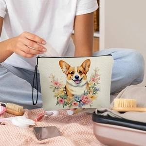 Minimalist canvas dog print makeup bag being packed for travel with cosmetics