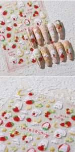Detail of 3D embossed nail art stickers with sweet bunny and strawberry motifs