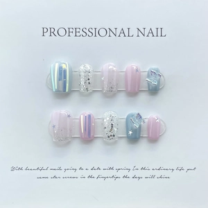 Handmade press-on nails set with blue, pink, and silver glitter with butterfly accents