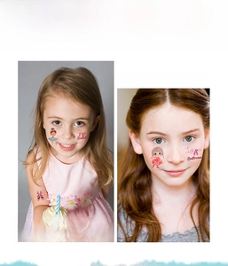 Detail showing cute ballerina temporary tattoos on child's face and arm for birthday parties